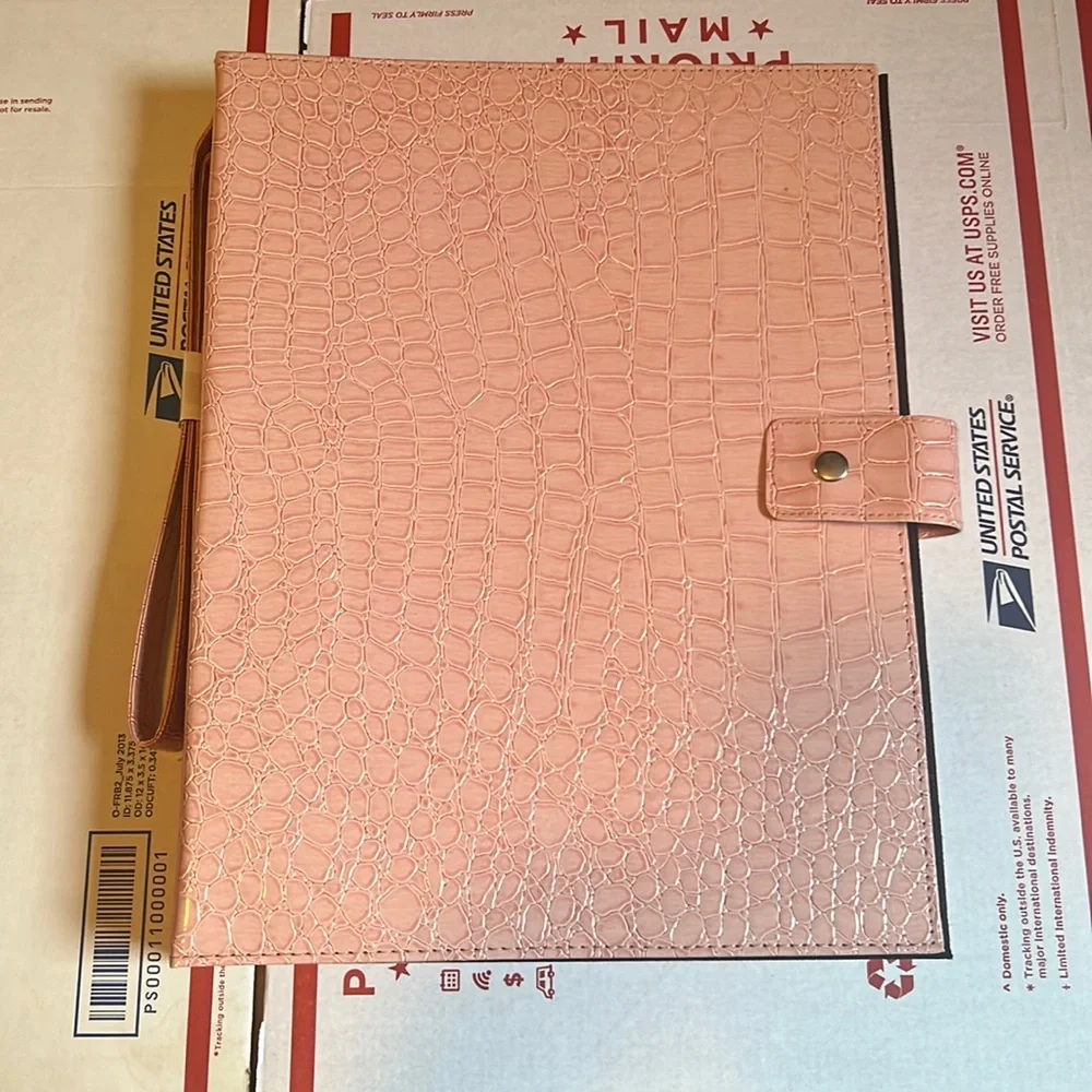 Pink crocodile pattern folder with clips